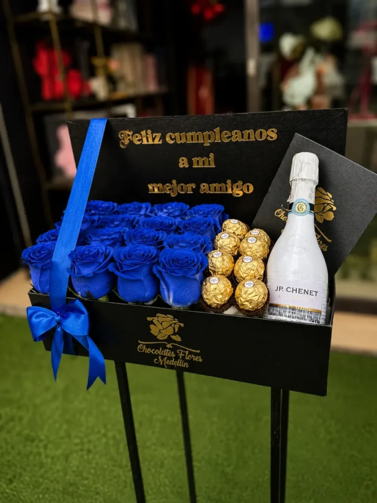 Caja libro con 16 rosas, ferreros y botella JP